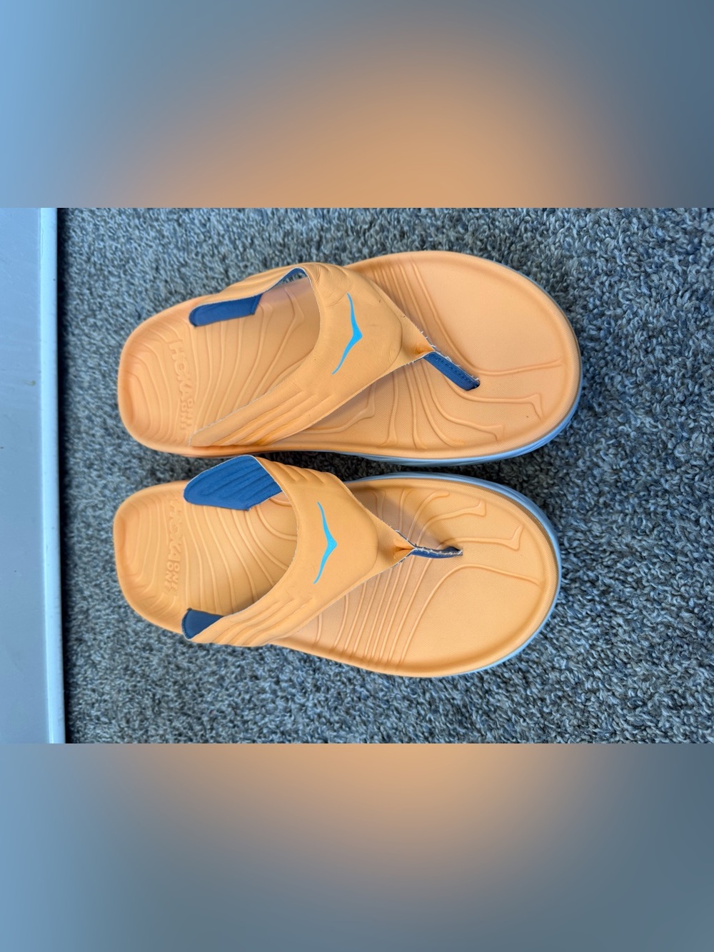 Hoka  size 11 men’s Orange and Blue Flip-Flop Sandals